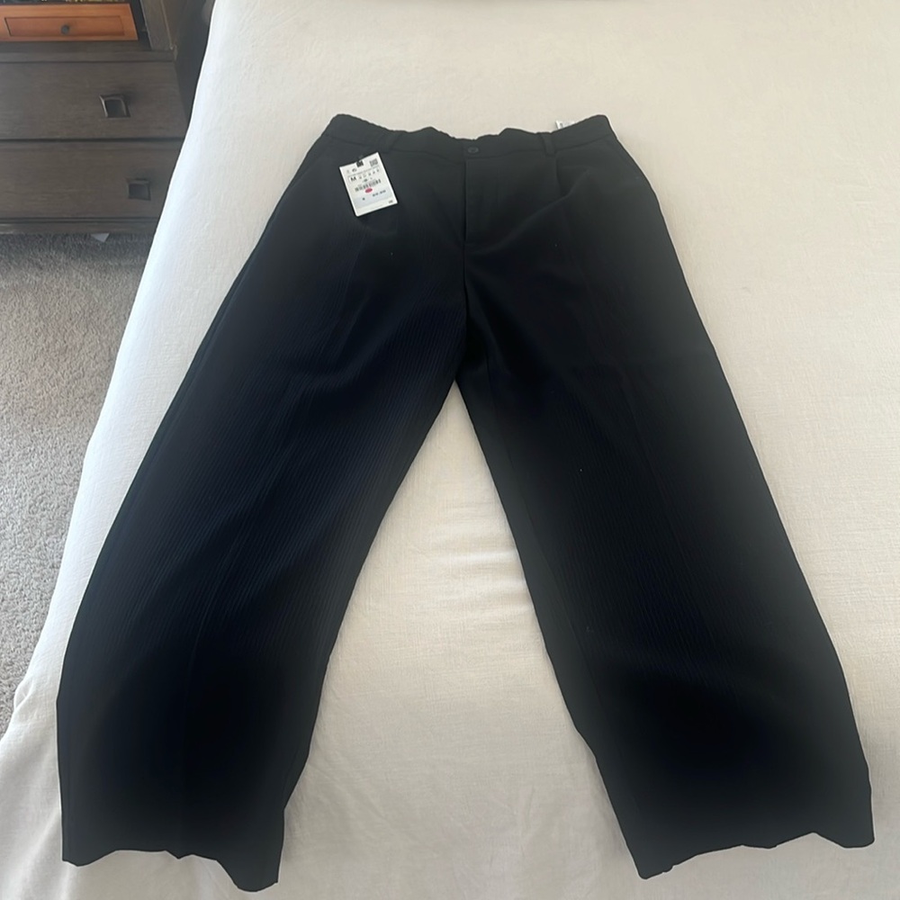 Long black pleaded Zara trousers